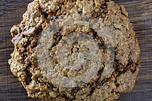 Crust on oat cookies as an abstract background or texture, closeup, top view, macro