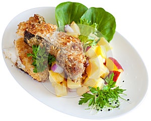 Crusted cod with peach and pineapple salsa