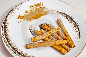 Crusted and powdered cinnamon on a decorative plate