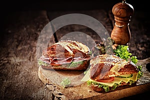 Crusty brown lye bread roll sandwiches