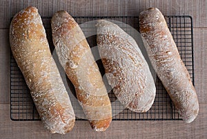 Crusty home made ciabatta sour dough bread loaves, baked during the Coronavirus lockdown.