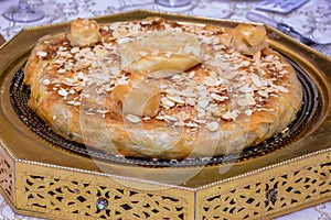 Crusty pie with chicken, close view, arabian style