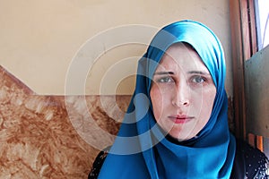 Crying arab muslim woman
