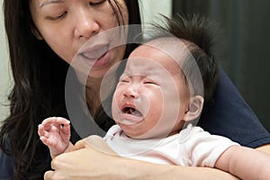 Crying Asian baby