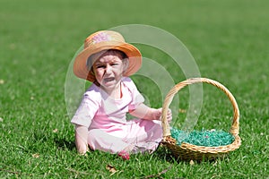 Crying baby on the meadow