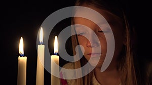 Crying Child by Candles, Sad Kid in Night, Upset Pensive Girl Face, Portrait