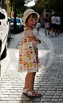 Crying girl on street