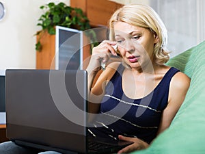 Crying lady receiving bad news