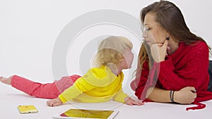 Crying little girl in hysterics, angry with parents due to ban on gadgets device