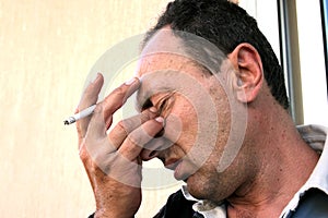 Crying man with cigarette