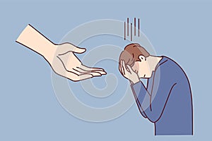 Crying man covers face bowing head while standing near giant hand hanging from sky. Vector image