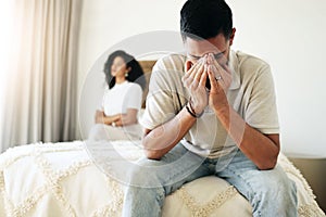 Crying, sad and couple in a conflict in the bedroom about depression, divorce or relationship mistake. Mental health