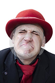 Crying sad man in red hat