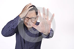 Crying Sad Young Man Showing Surrender Gesture