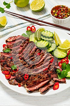 crying tiger, grilled and thinly sliced ribeye steak