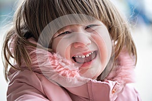 Crying toddler baby girl, soft focus, outside portrait, spring time.