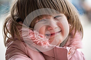 Crying toddler baby girl, soft focus, outside portrait, spring time.