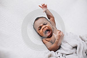 Crying and upset beautiful African American baby boy