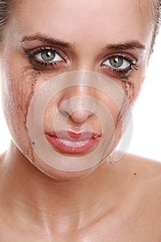 Crying woman with flowing make-up