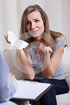 Crying woman during psychotherapy