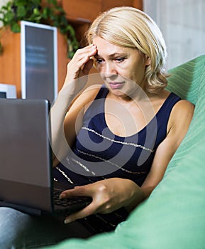 Crying woman receiving bad news