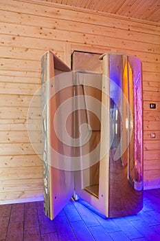 Cryotherapy capsule in the spa salon. Cryo sauna for the treatment of whole body cryotherapy
