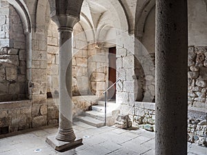 Crypt of a medieval abbey with carved stone columns