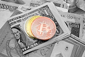 Crypto currency bitcoin coins on banknotes, digital virtual money concept