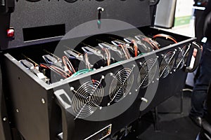 Crypto currency ethereum mining equipment rig - lots of gpu cards on mainboard. Graphics processing units connected to