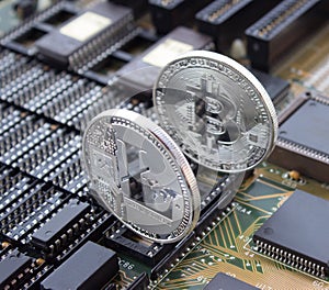 Crypto litecoin and bitcoin on a circuit board