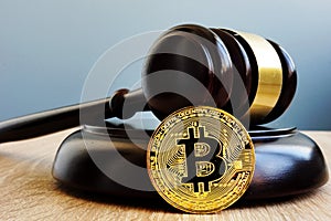 Crypto regulation. Gavel and cryptocurrency BTC Bitcoin.