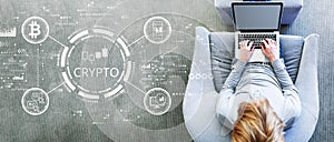 Crypto Trading theme with man using a laptop