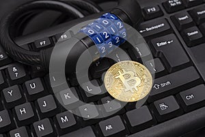 Cryptocurrency bitcoin with lock on keyboard. Bitcoin security