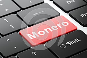 Cryptocurrency concept: Monero on computer keyboard background