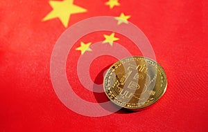 Bitcoin lay on Chinese flag.