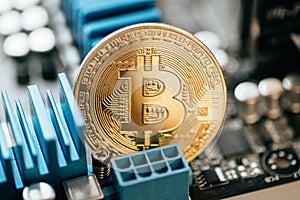 Cryptocurrency golden bitcoin coin in man hand - symbol of crypto currency - electronic virtual money for web banking