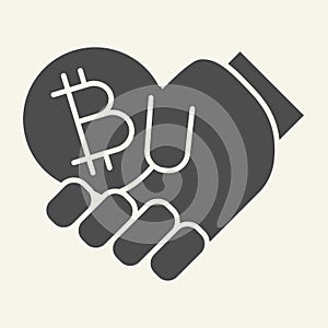 Cryptocurrency in hand solid icon. Bitcoin and arm vector illustration isolated on white. Hand holding crypto money