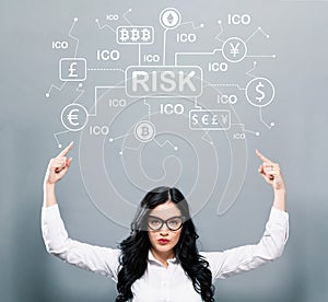 Cryptocurrency ICO risk theme with business woman pointing upwar