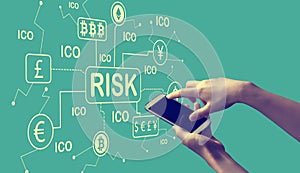 Cryptocurrency ICO risk theme with person holding smartphone