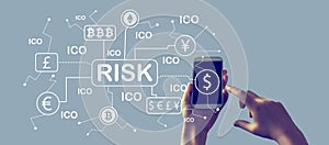 Cryptocurrency ICO risk theme with smartphone