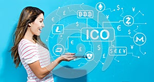 Cryptocurrency ICO theme with young woman using tablet