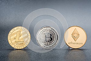 Cryptocurrency Lite coin,Silver Bitcoin,Ethereum on black background,Digital cryto currencies.Virtual money.