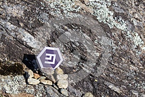 Cryptocurrency mining emercoin in a rock background