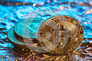 Cryptocurrency physical golden bitcoin coin on colorful background