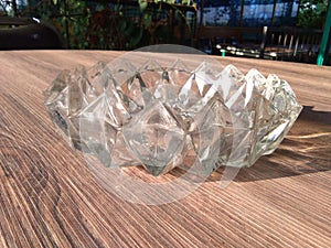 crystal ashtray on table