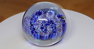 Crystal ball with blue marquetry