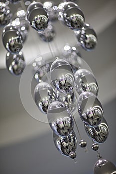 Crystal ball chandelier suspended from the ceiling