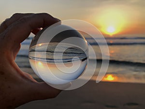 Crystal ball in hand, refraction photography