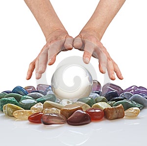 Crystal ball, healing crystals and psychic hands