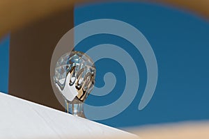 Crystal Ball representing Hand Holding the Sphere